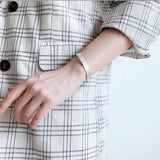 SABONA 7mm brushed silver copper bracelet worn on the wrist