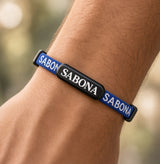 SABONA blue athletic magnetic bracelet worn on the wrist
