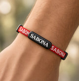 SABONA red athletic magnetic bracelet worn on the wrist