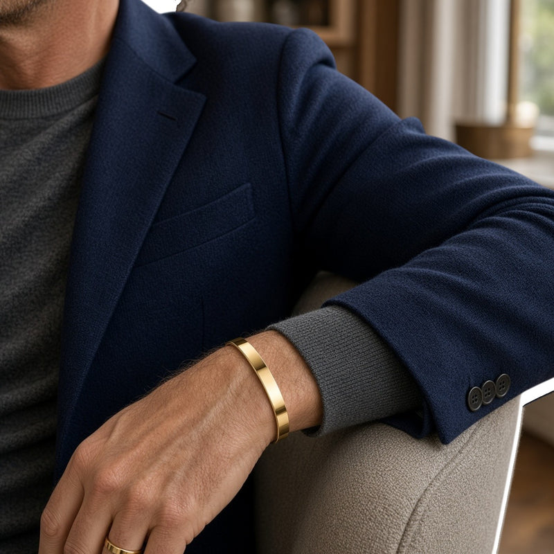 Man wearing a SABONA gold-plated copper bangle with autumn clothing