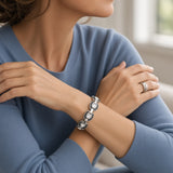SABONA Gem Black Horseshoe magnetic bracelet worn on a woman's wrist